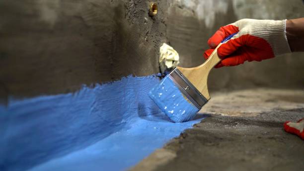 SJ Waterproofing Pros commercial waterproofing team near Arlington, KS